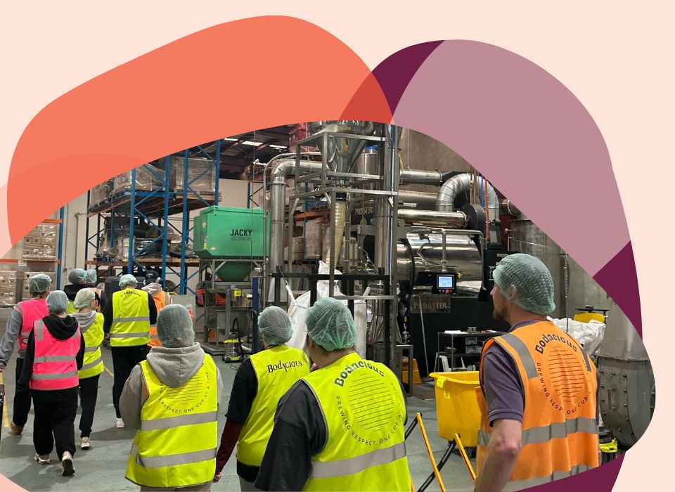 Students walking through factory